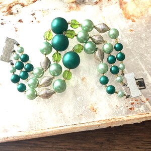 Vintage, 3 Strand, Shades of Green, Silver tone accents, Graduated, Silver tone clasp, Bracelet