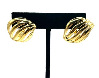 Givenchy signed, Omega back, gold tone, swirl, priced earrings, classic design, wavy design,