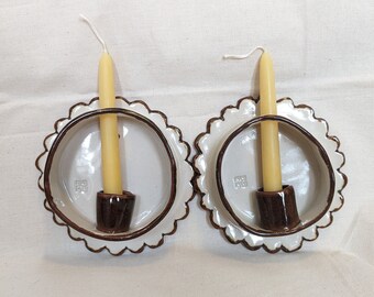 Pair of scalloped edge ceramic dark red and white wall sconces, candle holder