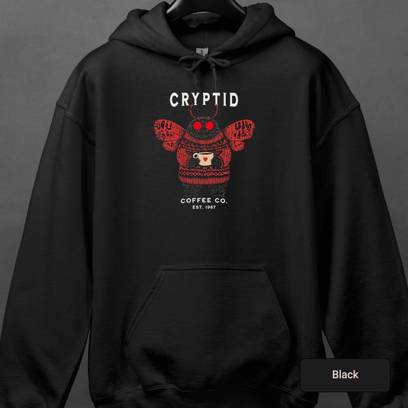 a black hoodie with a picture of a skull on it