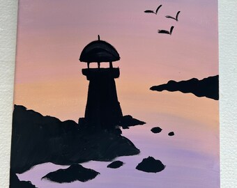 May include: A painting of a black silhouette of a lighthouse on a rocky shore with a purple and orange sunset sky. Three black birds fly in the sky.