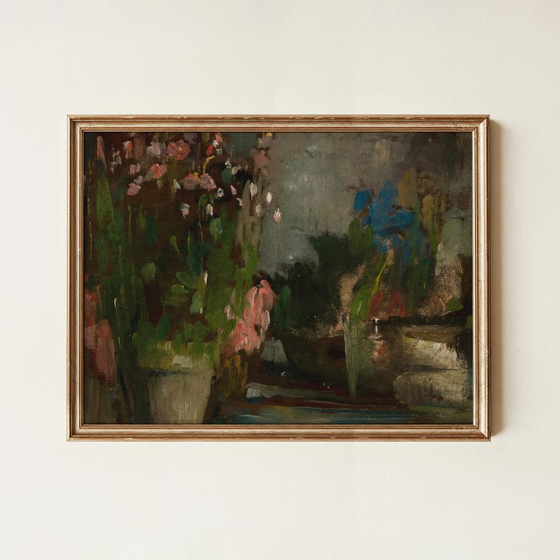 May include: A framed oil painting featuring a dark, moody landscape with a cluster of pink and white flowers in a pot on the left, deep green foliage, and a muted blue sky, all enclosed within a thin, metallic gold-toned rectangular frame.