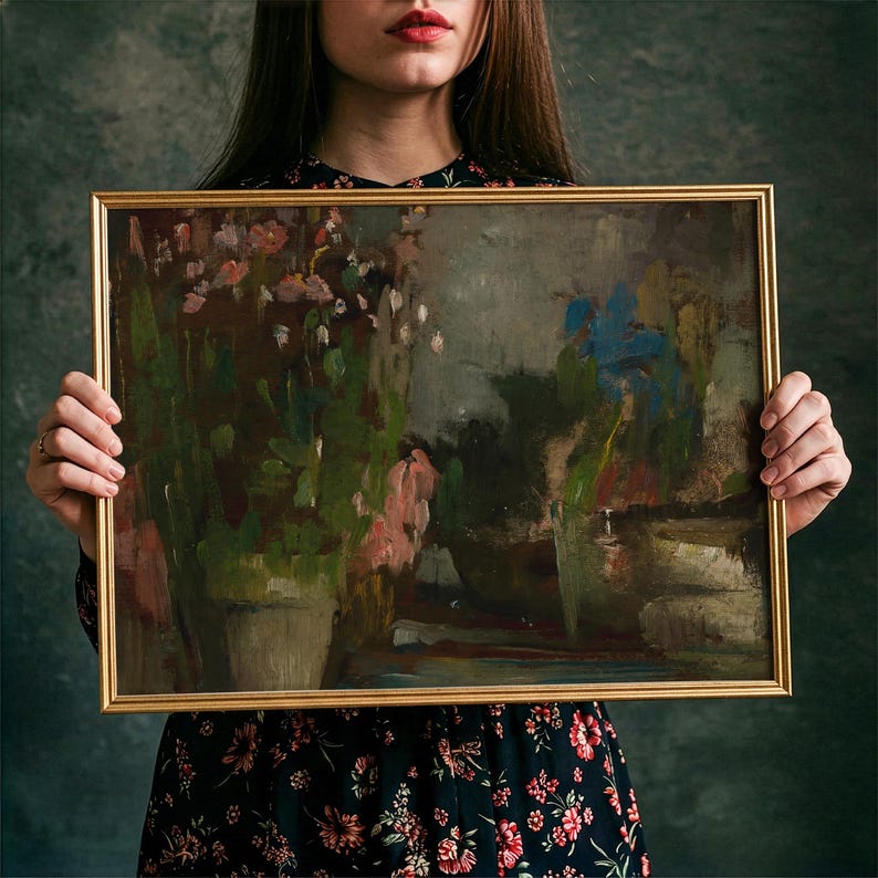 May include: A rectangular painting in a thin gold frame featuring an impressionistic scene of potted plants with muted green, brown, and pink tones, alongside a prominent blue floral element, all rendered with visible, textured brushstrokes.