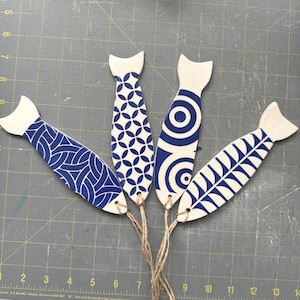 ceramic fish with modern geometric design pippip