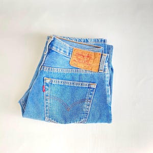 Womens w30 90s vintage Levi's 501 (32x30, actual 30x29).
