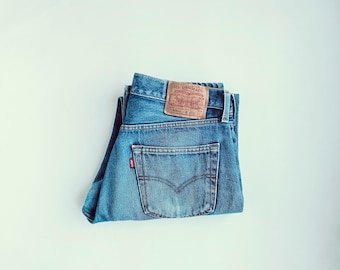 W32 vintage 501xx (Anhänger 33x32, eigentlich 32x29). Hellblau waschen, ausgeblichen.