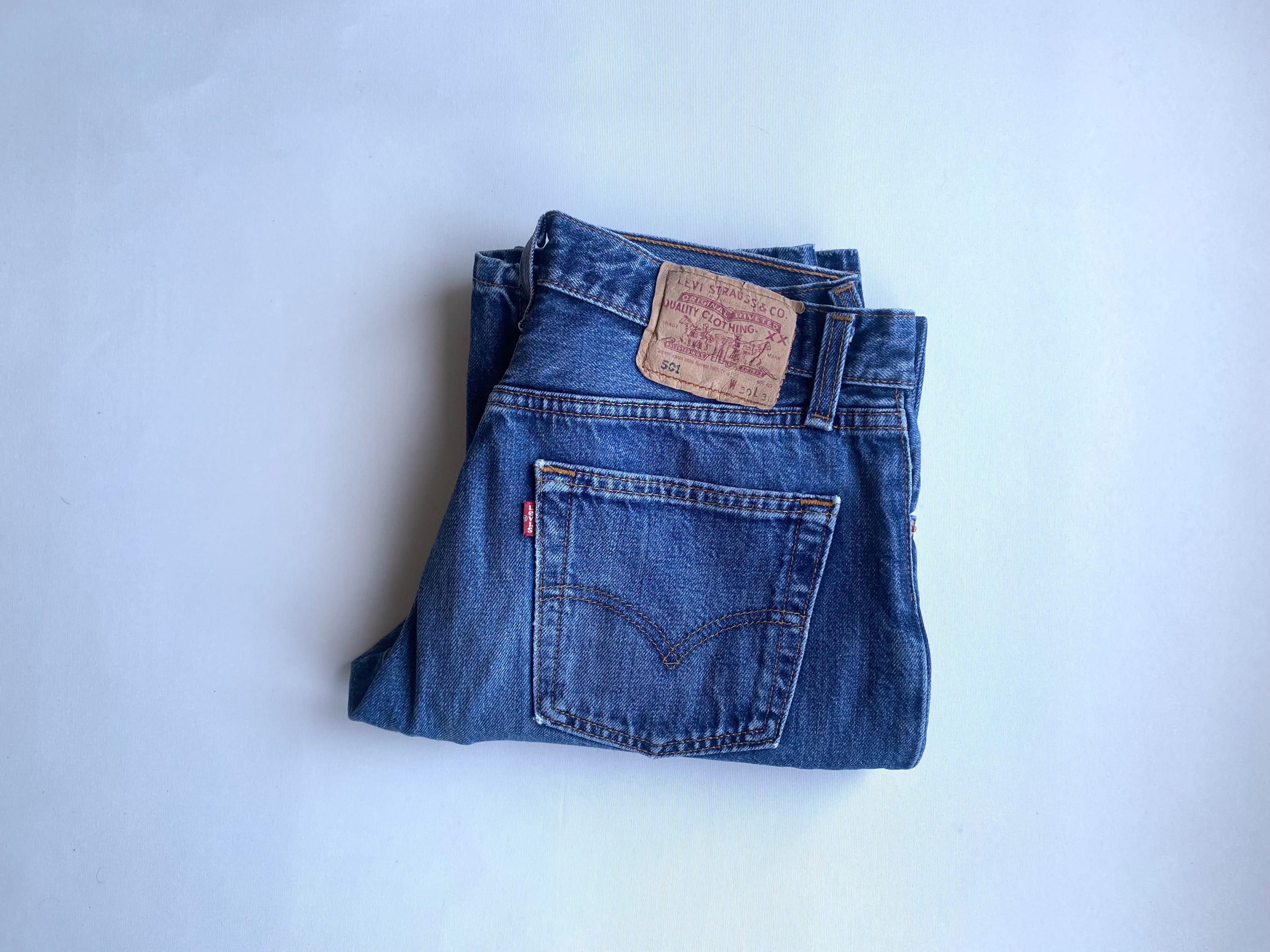 90s Vintage Levi's 501 (30x30, actual 29x29). Made in UK 1999, medium blue wash.