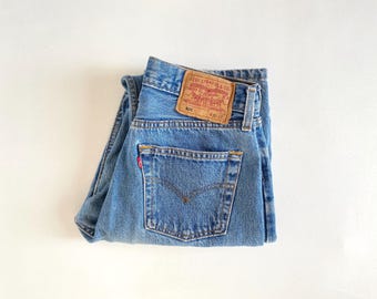 W28 vintage 501 (tag 30x32, actual 28.5x30). Light blue, produced 1996.