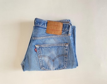 W30 l28 vintage 501xx (tag 32x32, actual 30x28). Light blue, faded shrink-to-fit.