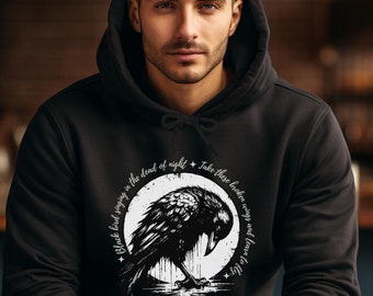 May include: Black hoodie with a white graphic of a crow with the text "Black bird singing in the dead of night. Take these broken wings and learn to fly."