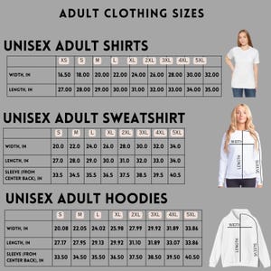 Peut inclure: Tableau des tailles pour chemises, sweatshirts et sweats &agrave; capuche unisexes pour adultes. Le tableau affiche les mesures en cm pour la largeur, la longueur et la longueur des manches, des tailles XS &agrave; 5XL. Deux femmes portent des v&ecirc;tements.