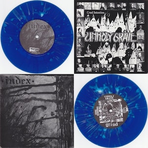 May include: Two blue vinyl records with white splatter paint. The record on the left has the word "index" printed on the label. The record on the right has the words "Unholy Grave" and "Grind" printed on the label.