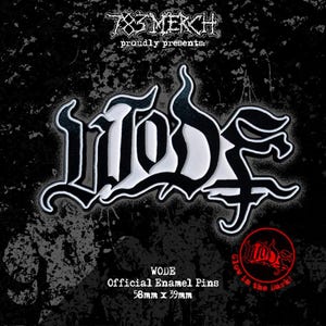 May include: Black and white enamel pin with the word "WODE" in a stylized font. The pin is 58mm x 39mm and glows in the dark. The text "783 MERCH proudly presents" is at the top.