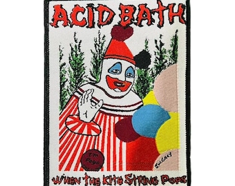 May include: Embroidered patch with a clown design, wearing red and white striped clothing and a red hat. The patch has the text "ACID BATH" and "WHEN THE KITE STRING POPS". The clown is holding up a hand.