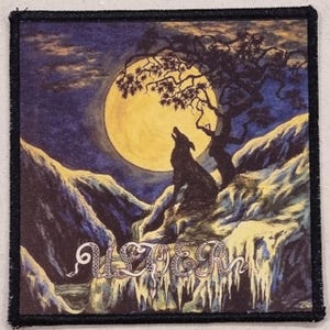 May include: Square patch featuring a wolf howling at a full moon. The design includes a tree, mountains, and the word "ULVER" in a stylized font. The color palette is dominated by blues, yellows, and blacks.