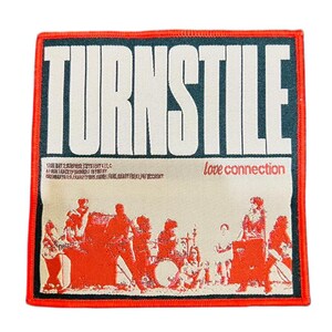 May include: A square patch with a red border. The patch features the band name "TURNSTILE" in large white letters over a dark teal background. The words "love connection" are in red, with a band illustration.