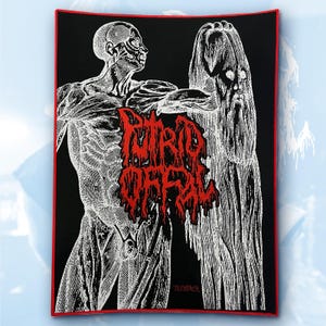 May include: Black patch with a red border featuring a detailed anatomical illustration of a human figure. The figure is in white, with a red, stylized text overlay that reads "PUTRID MARSH". A second figure is also present.