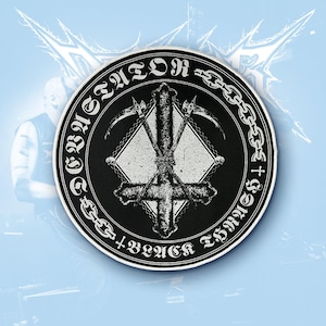 May include: A circular black and white embroidered patch featuring a central inverted cross wrapped in chains, flanked by two scythes. The border contains the text "DEVASTATOR" and "BLACK THRASH" in a gothic font, separated by small crosses.