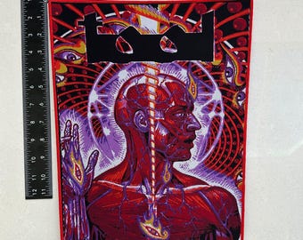 May include: A large, rectangular patch with a red border. The patch features a detailed illustration of a human head and torso in shades of red and purple, with the band's logo at the top. The patch measures approximately 12 inches in height.