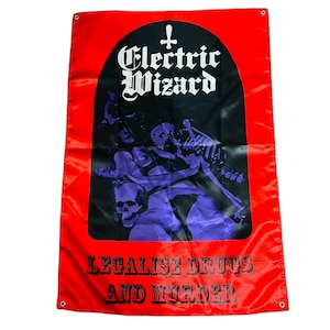 May include: Red banner featuring the words "Electric Wizard" in white gothic lettering, above a purple illustration of skeletons and figures. The banner's base reads "Legalise Drugs and Murder" in black.