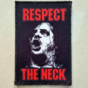 May include: Black rectangular patch with the words "RESPECT THE NECK" in red block letters. The patch features a black and white image of a person screaming. The patch has a black frayed border.