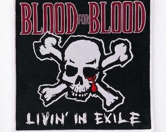 May include: Square black patch with a white border. It features a skull with a red blood drop and crossed bones. The text "BLOOD FOR BLOOD" is arched above the skull, and "LIVIN' IN EXILE" is below.