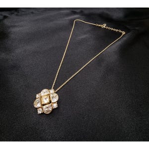 Zeldzame vintage Christian Dior goudkleurige ketting met kristallen bloemenhanger