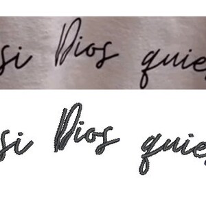 May include: The phrase "si Dios quiere" in elegant cursive script. The text, meaning "if God wills," is displayed in a dark color against a light, textured background. The design is simple and focused on the message.