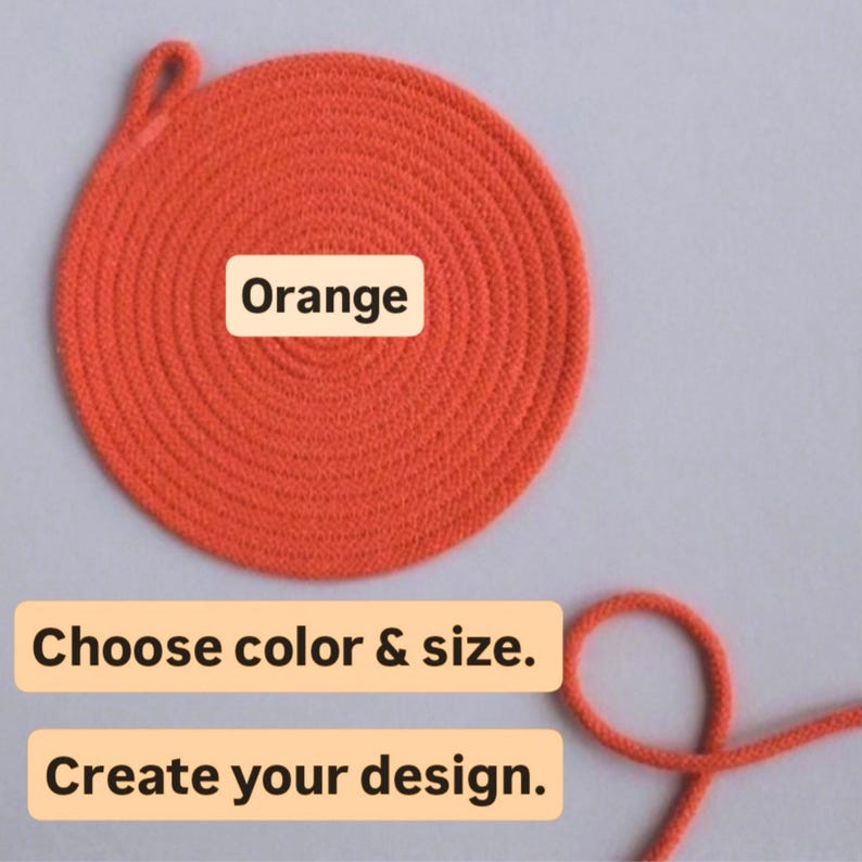 May include: A circular orange woven item with a loop, possibly a coaster or trivet. The word "Orange" is displayed on the item. Text below reads "Choose color & size." and "Create your design."