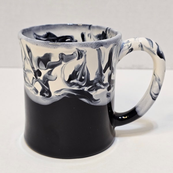 Handmade Mississippi Pottery Blue Swirl Mug. Each piece is individually handcrafted and unique!