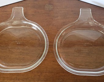Vintage, Set of 2 Pyrex Glass Grab-it plates, Heat and serve single serving plates with molded handle, "Pumpkin" shaped, oven / micro safe,
