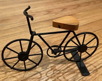 Soporte para asiento de bicicleta de madera negra con decoración vintage Art Déco