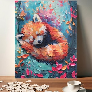 Może przedstawiać: Malowanie przedstawiające śpiącego pandę czerwoną, zwiniętą na łóżku z kolorowych liści. Tło jest w żywym błękicie z różowymi i zielonymi akcentami.