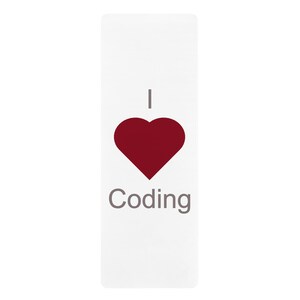 May include: White yoga mat with a red heart and the text "I love Coding" in gray.