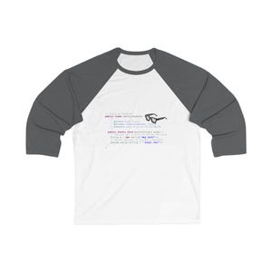 May include: White and grey baseball tee featuring a graphic of code, glasses, and the text "Great Job!". The shirt has three-quarter length sleeves and a crew neck. The design is in black and blue.