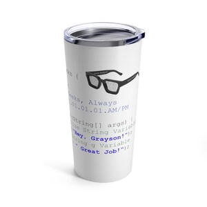 May include: White travel tumbler with a silver lid. The tumbler features a black graphic of glasses with the text "Geek Output." Blue and gray text includes "Hey, Grayson!" and "Great Job!"
