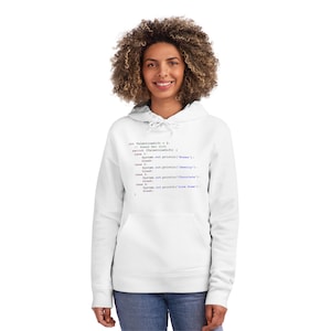 May include: White hoodie with a code snippet printed on the front. The code is written in Java and includes the text "int ValentineGift = 2; // Guess the gift" and a switch statement with cases for "Roses", "Jewelry", "Chocolate", and "Love Poem".
