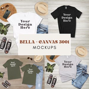 K&ouml;nnte beinhalten: Ein Mockup mit wei&szlig;en, schwarzen, olivgr&uuml;nen und hellgrauen T-Shirts mit dem Text "Your Design Here". Die Shirts werden mit Jeans, H&uuml;ten, Schuhen, Sonnenbrillen und einem Telefon pr&auml;sentiert. Der Text "BELLA + CANVAS 3001 MOCKUPS" ist ebenfalls vorhanden.