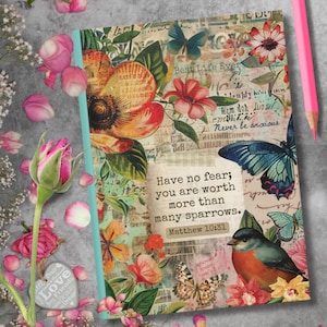 May include: A colorful journal with a floral design and a quote from the Bible: "Have no fear; you are worth more than many sparrows. Matthew 10:31".