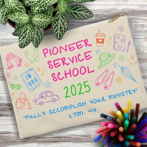 May include: A white canvas pouch with a colorful doodle design. The text "PIONEER SERVICE SCHOOL 2025" is written in pink and green. The text "FULLY ACCOMPLISH YOUR MINISTRY" is written in black with the scripture reference "2 TIM. 4:5" underneath.