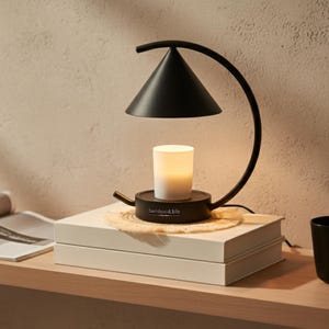 May include: A set of three ceramic mugs with a speckled, matte finish. The mugs are in shades of cream, light brown, and dark brown. Each mug has a simple, minimalist design and a rounded handle.