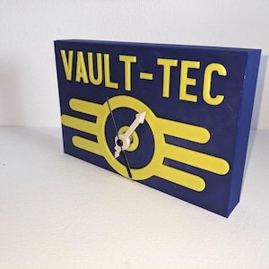 Orologio Vault-Tec: decorazione da scrivania o da parete ispirata a Fallout, in blu e giallo o in un colore personalizzato