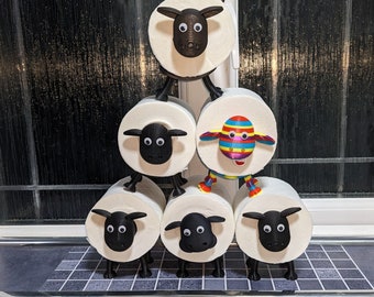 Universal fitting Sheep toilet roll holders , Shane, Shelly, Tommy and Ewe- Anne Black and rainbow coloured flock