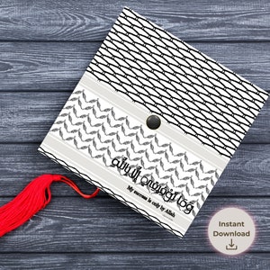 May include: Black and white graduation cap with a keffiyeh pattern. The cap has a black button and the text "My success is only by Allah" in English and Arabic.