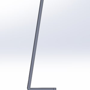 May include: A gray metal bracket with a right-angle bend. The bracket has a rectangular cross-section and is positioned against a white background. The design is simple and industrial.