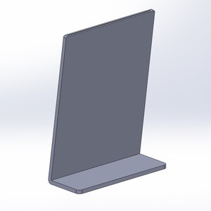 May include: A gray, angled metal display stand with a rectangular base and a tall, upright panel. The stand is made of a solid, matte material and is designed to hold items upright.