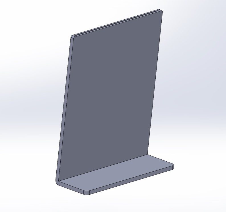 May include: A gray, angled metal display stand with a rectangular base and a tall, upright panel. The stand is made of a solid, matte material and is designed to hold items upright.
