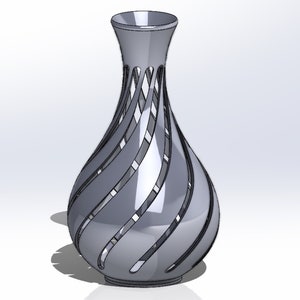 May include: A silver vase with a unique, intricate design of swirling, cut-out lines. The vase has a wide base and a narrow neck.