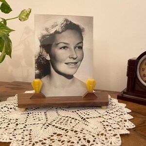 Wooden photo frame with two decorative art deco glass elements from the 1930s