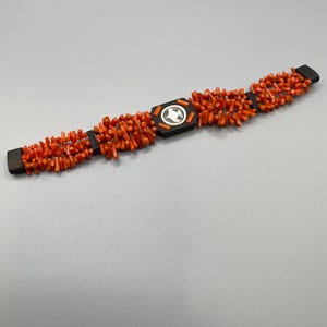 Elegant bracelet with corals and cameo